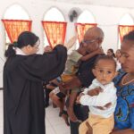 Upacara Gerejawi Baptisan dan Penyerahan Anak di PosPel Arso XI